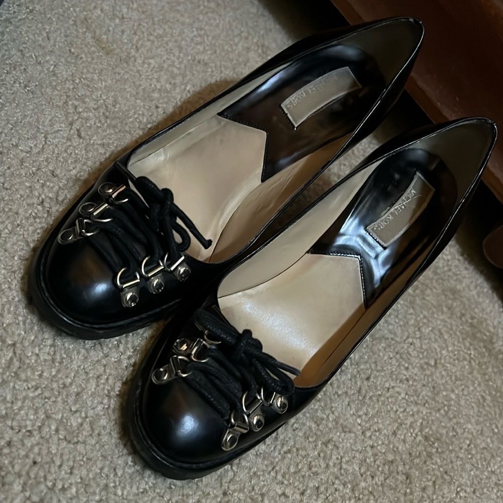 Michael Kors lace up pumps.